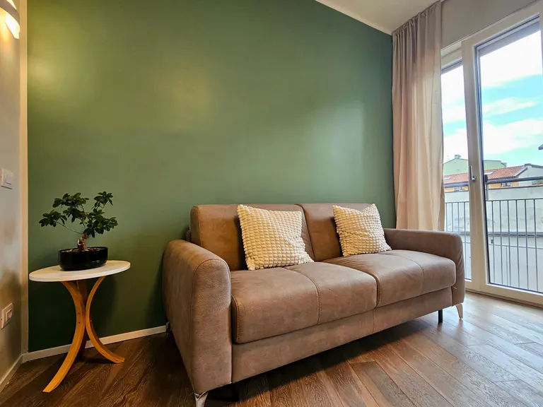 Divano letto e zona relax in soggiorno
