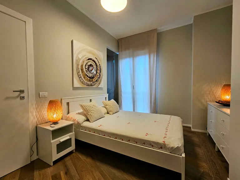 Camera con letto matrimoniale alla francese